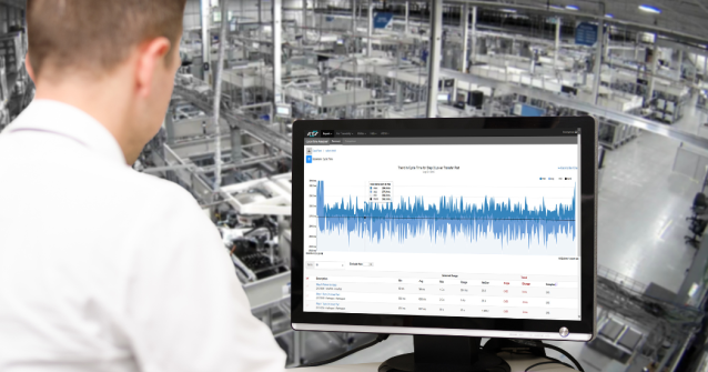 ATS Employee Looking at Data on a Computer.