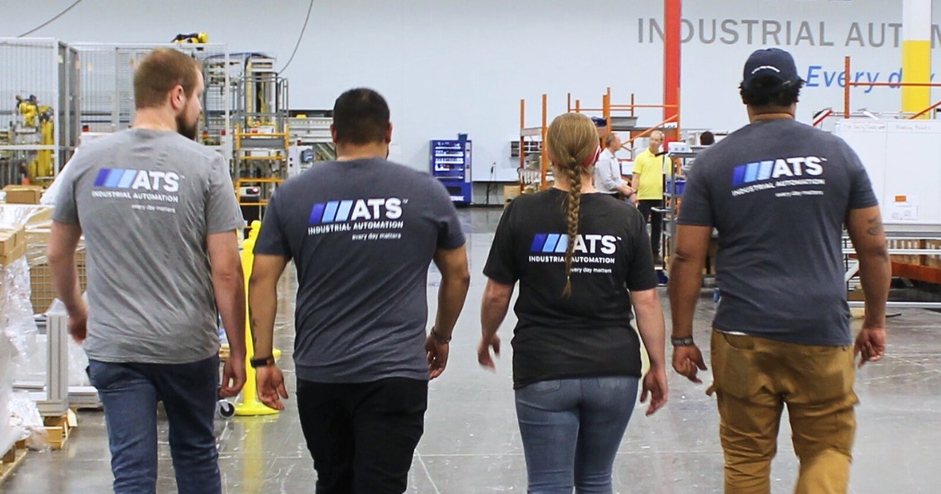 ATS Industrial Automation team walking away.