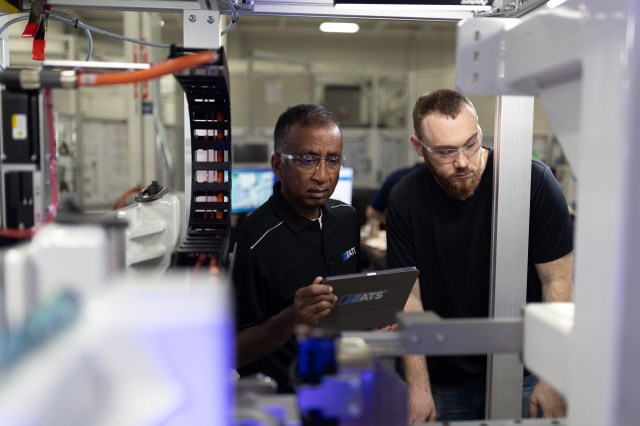 ATS team members working on equipment