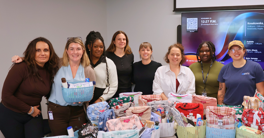 Members of the ATS Professional Women's Network building personal care baskets for the new YMCA Women's Shelter in Cambridge, Ontario.