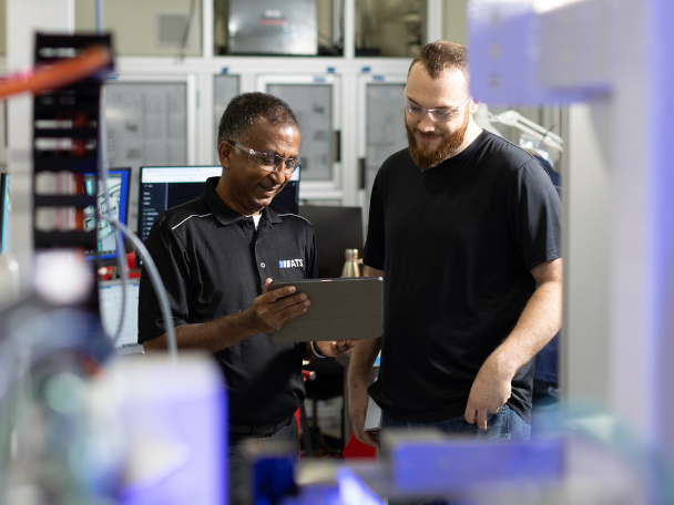 ATS Employees working on equipment